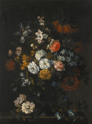 Still Life of Peonies, Narcissi, an Iris and other flowers in a glass vase on a stone ledge